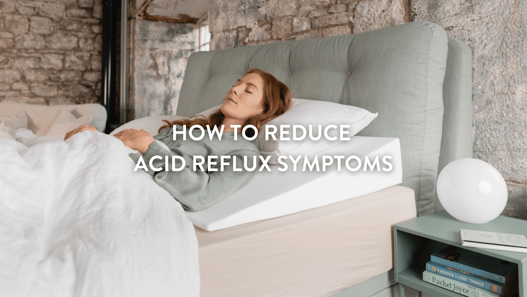 person lying in bed sleeping using a Putnams bed wedge to reduce acid reflux